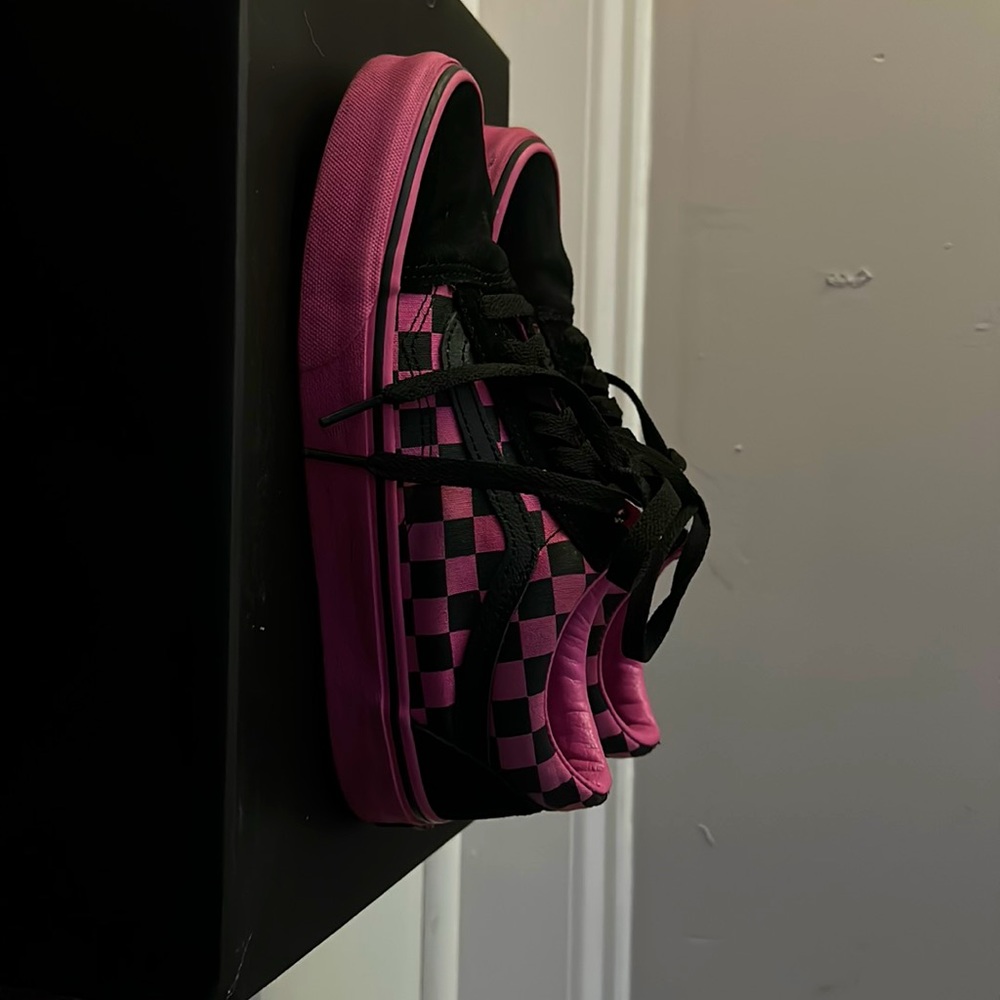 Black and pink checker vans
